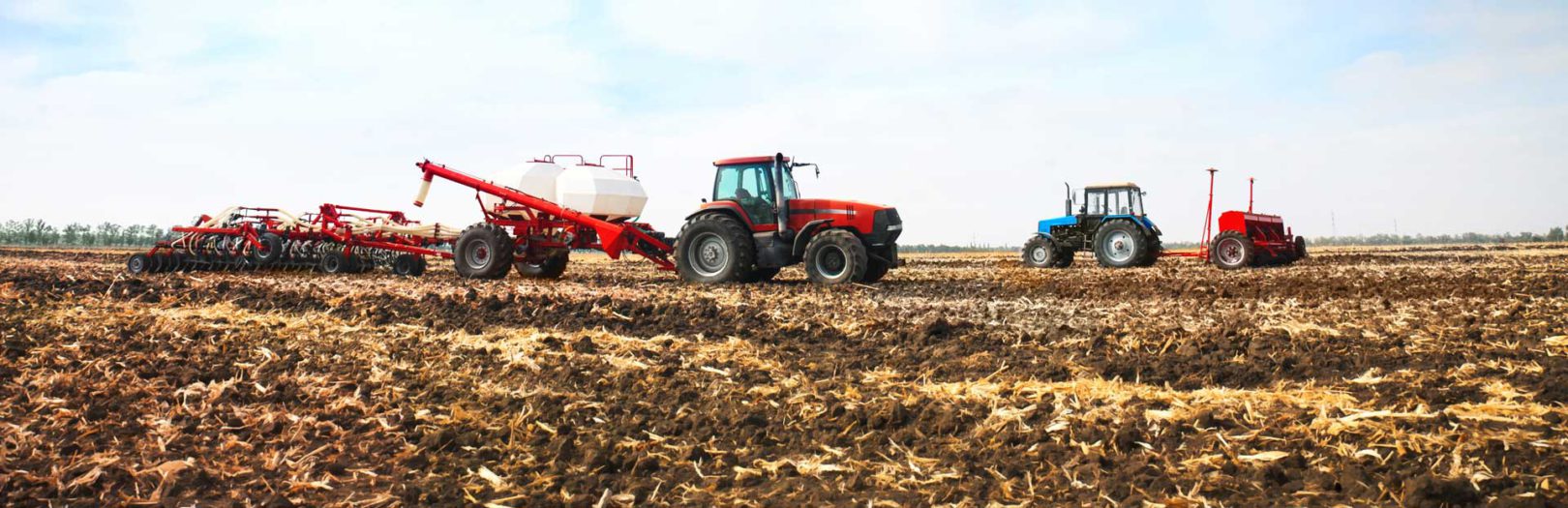 Tractors farmers field.